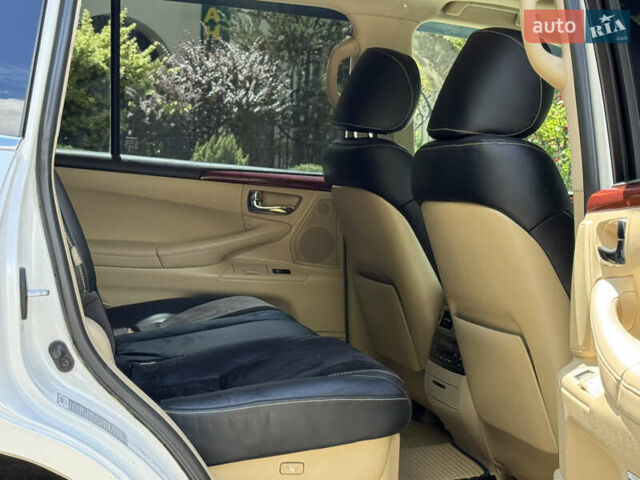 Білий Лексус ЛХ, об'ємом двигуна 5.66 л та пробігом 202 тис. км за 25500 $, фото 100 на Automoto.ua