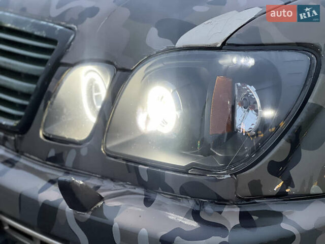 Бежевий Лексус ЛХ, об'ємом двигуна 4.66 л та пробігом 225 тис. км за 8750 $, фото 8 на Automoto.ua