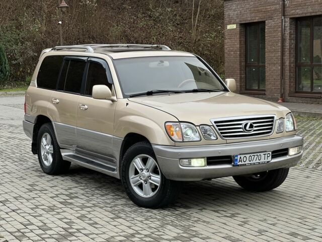 Бежевый Лексус ЛХ, объемом двигателя 4.7 л и пробегом 260 тыс. км за 13500 $, фото 1 на Automoto.ua