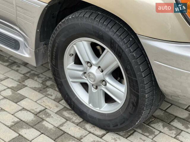 Бежевий Лексус ЛХ, об'ємом двигуна 4.7 л та пробігом 260 тис. км за 13500 $, фото 14 на Automoto.ua