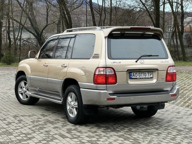 Бежевый Лексус ЛХ, объемом двигателя 4.7 л и пробегом 260 тыс. км за 13500 $, фото 3 на Automoto.ua