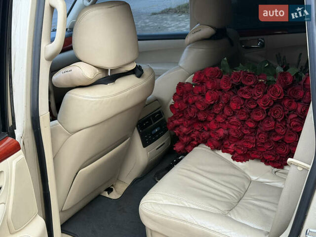 Бежевый Лексус ЛХ, объемом двигателя 5.66 л и пробегом 205 тыс. км за 18999 $, фото 19 на Automoto.ua