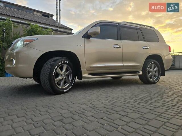 Бежевый Лексус ЛХ, объемом двигателя 5.66 л и пробегом 220 тыс. км за 25500 $, фото 3 на Automoto.ua