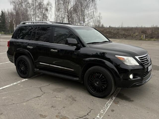 Черный Лексус ЛХ, объемом двигателя 5.7 л и пробегом 330 тыс. км за 21500 $, фото 1 на Automoto.ua