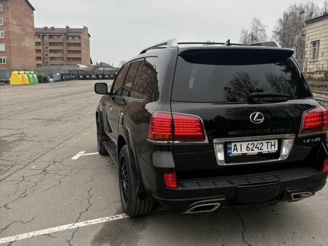 Черный Лексус ЛХ, объемом двигателя 5.7 л и пробегом 330 тыс. км за 21500 $, фото 3 на Automoto.ua