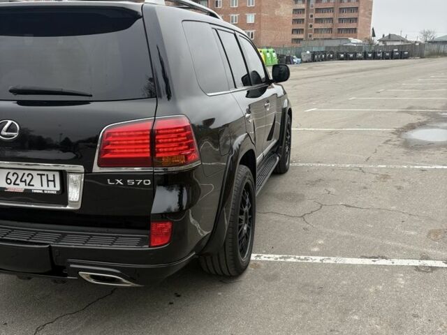 Черный Лексус ЛХ, объемом двигателя 5.7 л и пробегом 330 тыс. км за 21500 $, фото 2 на Automoto.ua