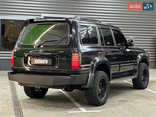 Черный Лексус ЛХ, объемом двигателя 4.5 л и пробегом 130 тыс. км за 17000 $, фото 5 на Automoto.ua