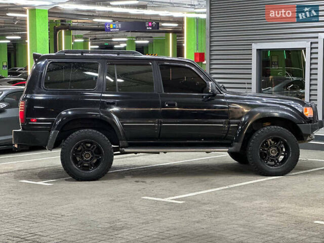 Черный Лексус ЛХ, объемом двигателя 4.5 л и пробегом 130 тыс. км за 17000 $, фото 7 на Automoto.ua