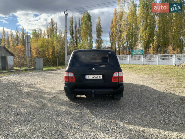 Черный Лексус ЛХ, объемом двигателя 4.66 л и пробегом 403 тыс. км за 8900 $, фото 5 на Automoto.ua