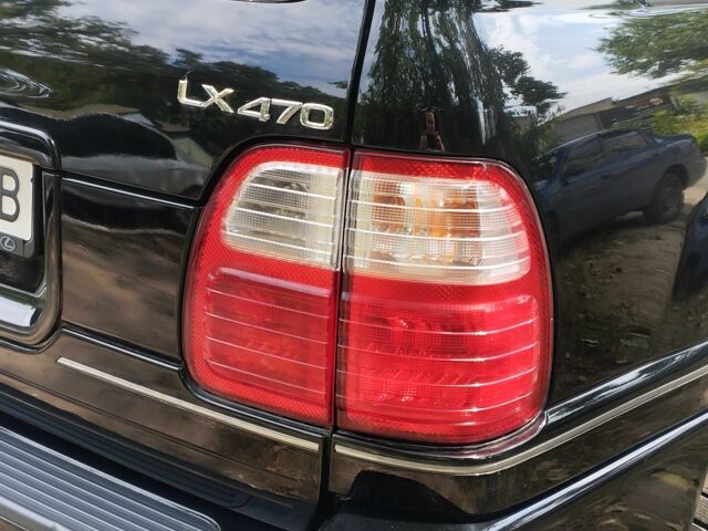 Черный Лексус ЛХ, объемом двигателя 4.7 л и пробегом 330 тыс. км за 11999 $, фото 4 на Automoto.ua