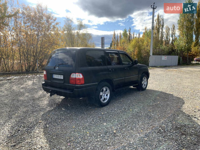 Черный Лексус ЛХ, объемом двигателя 4.66 л и пробегом 403 тыс. км за 8900 $, фото 4 на Automoto.ua