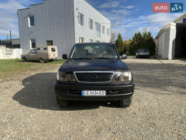 Черный Лексус ЛХ, объемом двигателя 4.66 л и пробегом 403 тыс. км за 8900 $, фото 1 на Automoto.ua