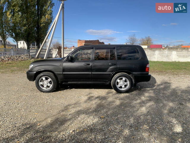 Черный Лексус ЛХ, объемом двигателя 4.66 л и пробегом 403 тыс. км за 8900 $, фото 6 на Automoto.ua