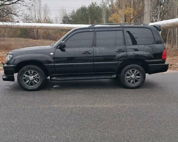 Черный Лексус ЛХ, объемом двигателя 4.67 л и пробегом 435 тыс. км за 10000 $, фото 1 на Automoto.ua