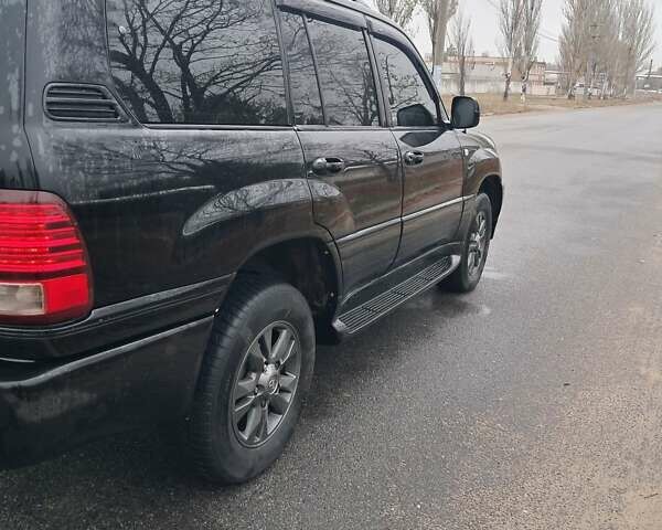 Черный Лексус ЛХ, объемом двигателя 4.67 л и пробегом 435 тыс. км за 10000 $, фото 10 на Automoto.ua