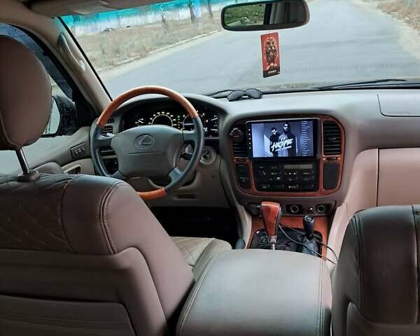 Черный Лексус ЛХ, объемом двигателя 4.67 л и пробегом 435 тыс. км за 10000 $, фото 2 на Automoto.ua