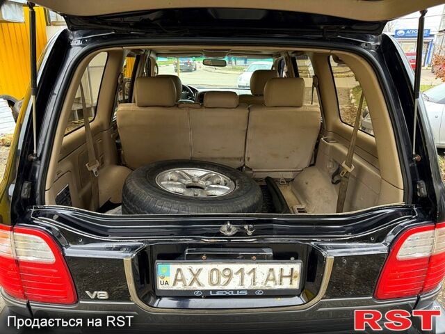 Чорний Лексус ЛХ, об'ємом двигуна 4.7 л та пробігом 237 тис. км за 8200 $, фото 11 на Automoto.ua