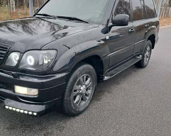 Черный Лексус ЛХ, объемом двигателя 4.67 л и пробегом 435 тыс. км за 10000 $, фото 7 на Automoto.ua