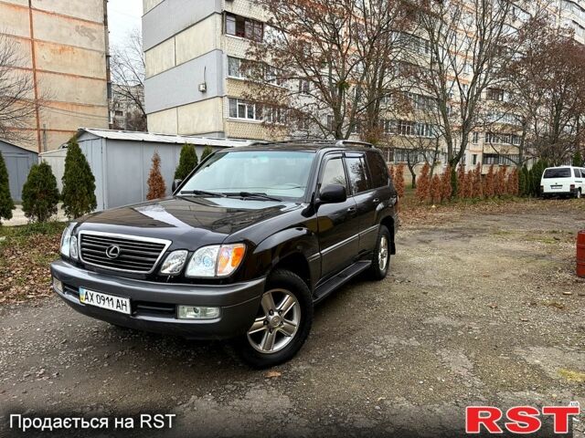 Чорний Лексус ЛХ, об'ємом двигуна 4.7 л та пробігом 237 тис. км за 8200 $, фото 1 на Automoto.ua