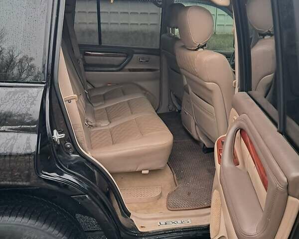 Черный Лексус ЛХ, объемом двигателя 4.67 л и пробегом 435 тыс. км за 10000 $, фото 5 на Automoto.ua