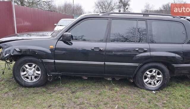 Черный Лексус ЛХ, объемом двигателя 4.66 л и пробегом 480 тыс. км за 5500 $, фото 4 на Automoto.ua