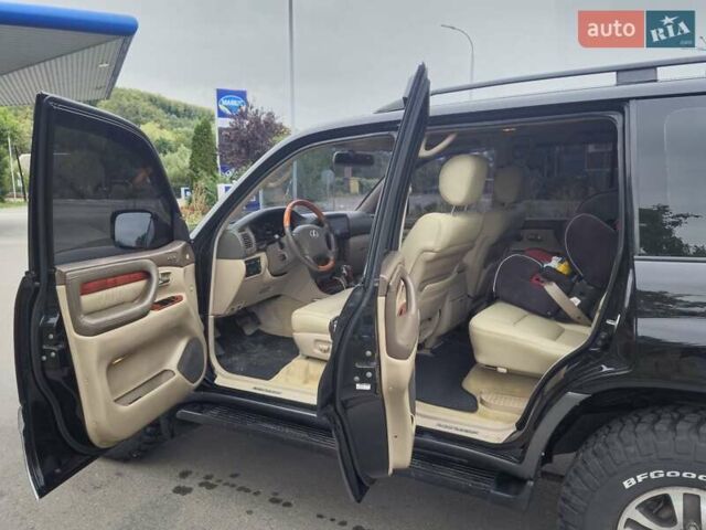 Черный Лексус ЛХ, объемом двигателя 4.7 л и пробегом 415 тыс. км за 16000 $, фото 23 на Automoto.ua