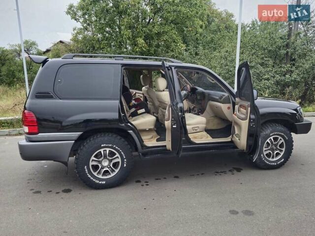 Черный Лексус ЛХ, объемом двигателя 4.7 л и пробегом 415 тыс. км за 16000 $, фото 9 на Automoto.ua
