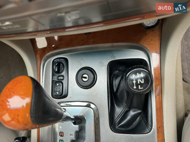 Чорний Лексус ЛХ, об'ємом двигуна 4.7 л та пробігом 330 тис. км за 13000 $, фото 2 на Automoto.ua