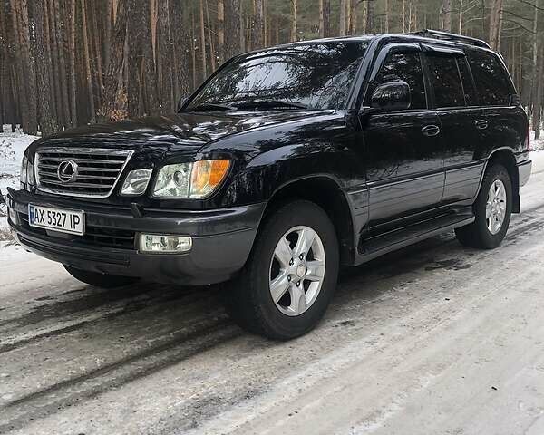 Черный Лексус ЛХ, объемом двигателя 4.7 л и пробегом 373 тыс. км за 15000 $, фото 2 на Automoto.ua