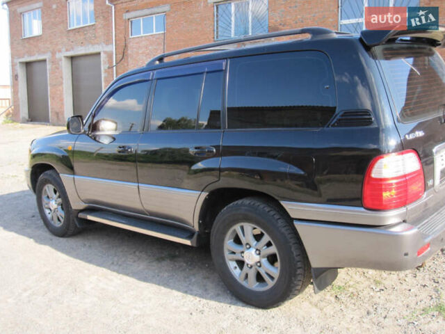 Чорний Лексус ЛХ, об'ємом двигуна 4.67 л та пробігом 286 тис. км за 12500 $, фото 3 на Automoto.ua