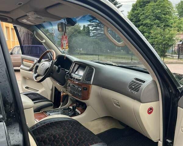 Черный Лексус ЛХ, объемом двигателя 4.66 л и пробегом 260 тыс. км за 18000 $, фото 9 на Automoto.ua