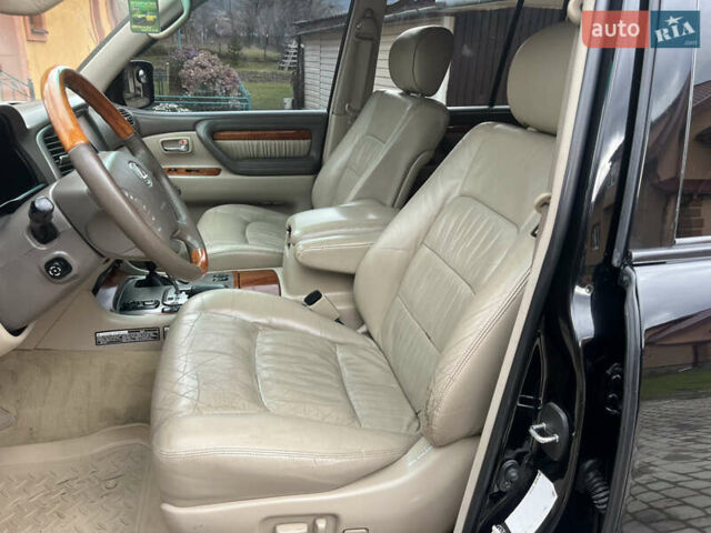 Черный Лексус ЛХ, объемом двигателя 4.66 л и пробегом 260 тыс. км за 13500 $, фото 10 на Automoto.ua