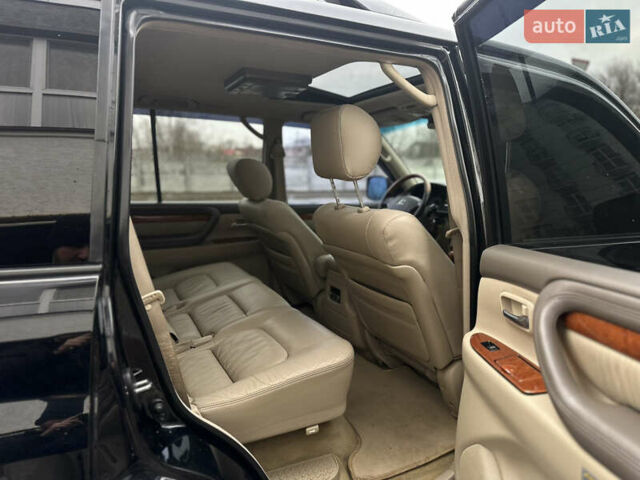 Черный Лексус ЛХ, объемом двигателя 4.66 л и пробегом 286 тыс. км за 13799 $, фото 19 на Automoto.ua