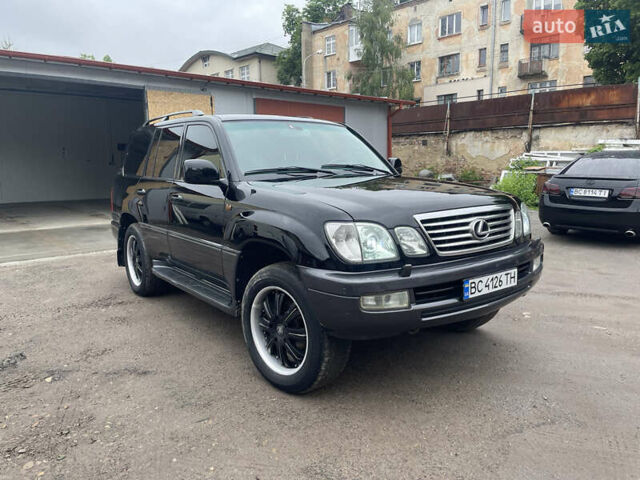 Черный Лексус ЛХ, объемом двигателя 4.66 л и пробегом 312 тыс. км за 16300 $, фото 1 на Automoto.ua
