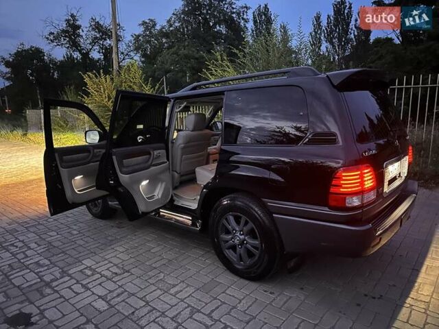 Черный Лексус ЛХ, объемом двигателя 4.66 л и пробегом 370 тыс. км за 14500 $, фото 1 на Automoto.ua