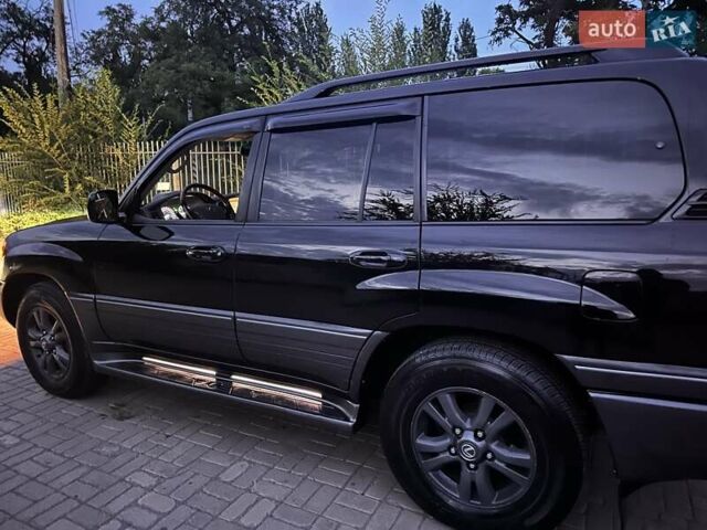 Черный Лексус ЛХ, объемом двигателя 4.66 л и пробегом 370 тыс. км за 14500 $, фото 2 на Automoto.ua