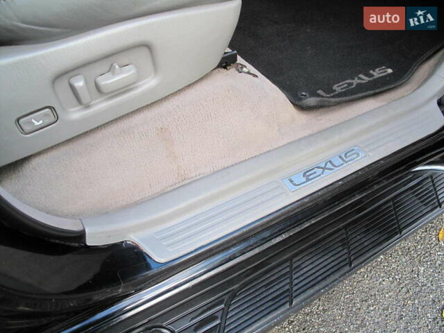 Чорний Лексус ЛХ, об'ємом двигуна 4.66 л та пробігом 303 тис. км за 13800 $, фото 47 на Automoto.ua