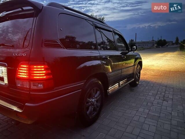 Черный Лексус ЛХ, объемом двигателя 4.66 л и пробегом 370 тыс. км за 14500 $, фото 6 на Automoto.ua