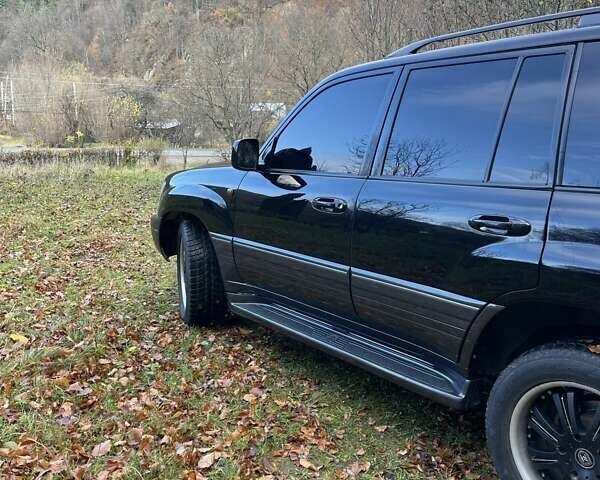 Чорний Лексус ЛХ, об'ємом двигуна 4.66 л та пробігом 317 тис. км за 14900 $, фото 10 на Automoto.ua