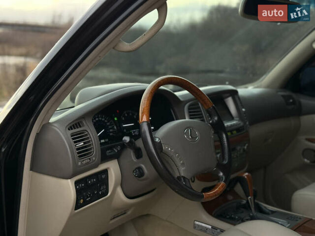 Черный Лексус ЛХ, объемом двигателя 4.7 л и пробегом 286 тыс. км за 13750 $, фото 11 на Automoto.ua