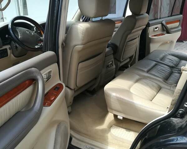 Черный Лексус ЛХ, объемом двигателя 4.7 л и пробегом 232 тыс. км за 14800 $, фото 3 на Automoto.ua