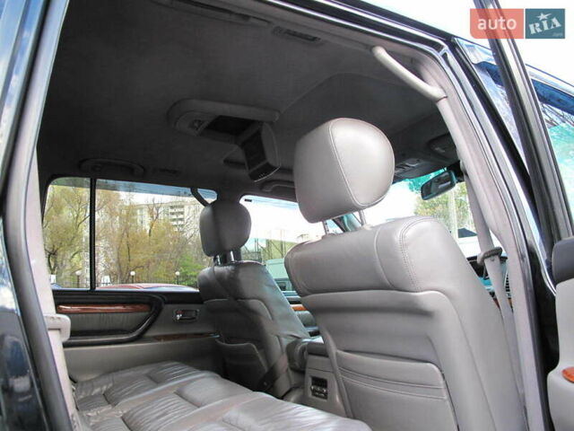 Чорний Лексус ЛХ, об'ємом двигуна 4.66 л та пробігом 303 тис. км за 13800 $, фото 59 на Automoto.ua