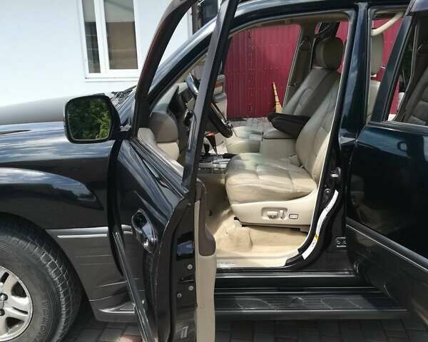 Черный Лексус ЛХ, объемом двигателя 4.7 л и пробегом 232 тыс. км за 14800 $, фото 2 на Automoto.ua