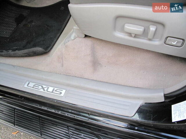 Чорний Лексус ЛХ, об'ємом двигуна 4.66 л та пробігом 303 тис. км за 13800 $, фото 16 на Automoto.ua