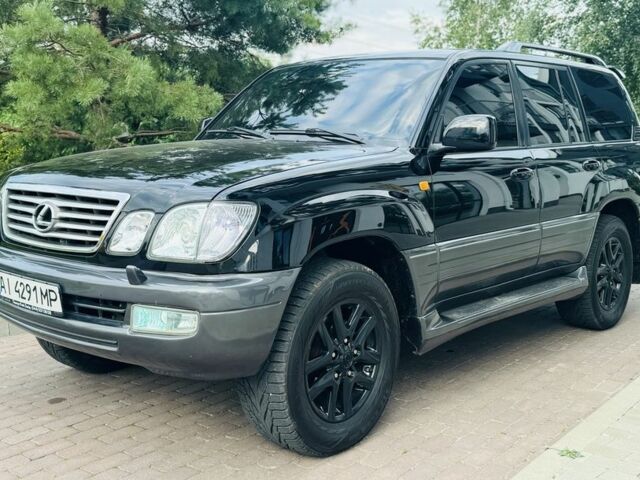 Черный Лексус ЛХ, объемом двигателя 4.7 л и пробегом 291 тыс. км за 12999 $, фото 1 на Automoto.ua