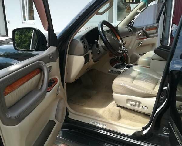 Черный Лексус ЛХ, объемом двигателя 4.7 л и пробегом 232 тыс. км за 14800 $, фото 4 на Automoto.ua