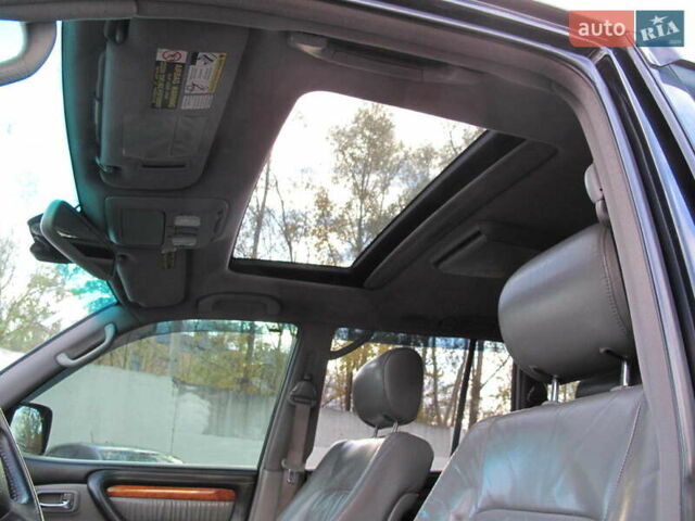 Чорний Лексус ЛХ, об'ємом двигуна 4.66 л та пробігом 303 тис. км за 13800 $, фото 22 на Automoto.ua