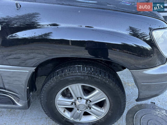 Чорний Лексус ЛХ, об'ємом двигуна 4.7 л та пробігом 300 тис. км за 14300 $, фото 7 на Automoto.ua