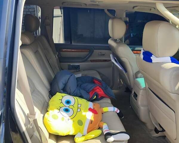 Чорний Лексус ЛХ, об'ємом двигуна 4.66 л та пробігом 287 тис. км за 14000 $, фото 20 на Automoto.ua