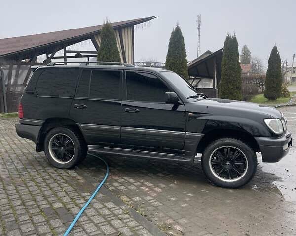 Чорний Лексус ЛХ, об'ємом двигуна 4.66 л та пробігом 317 тис. км за 14900 $, фото 2 на Automoto.ua